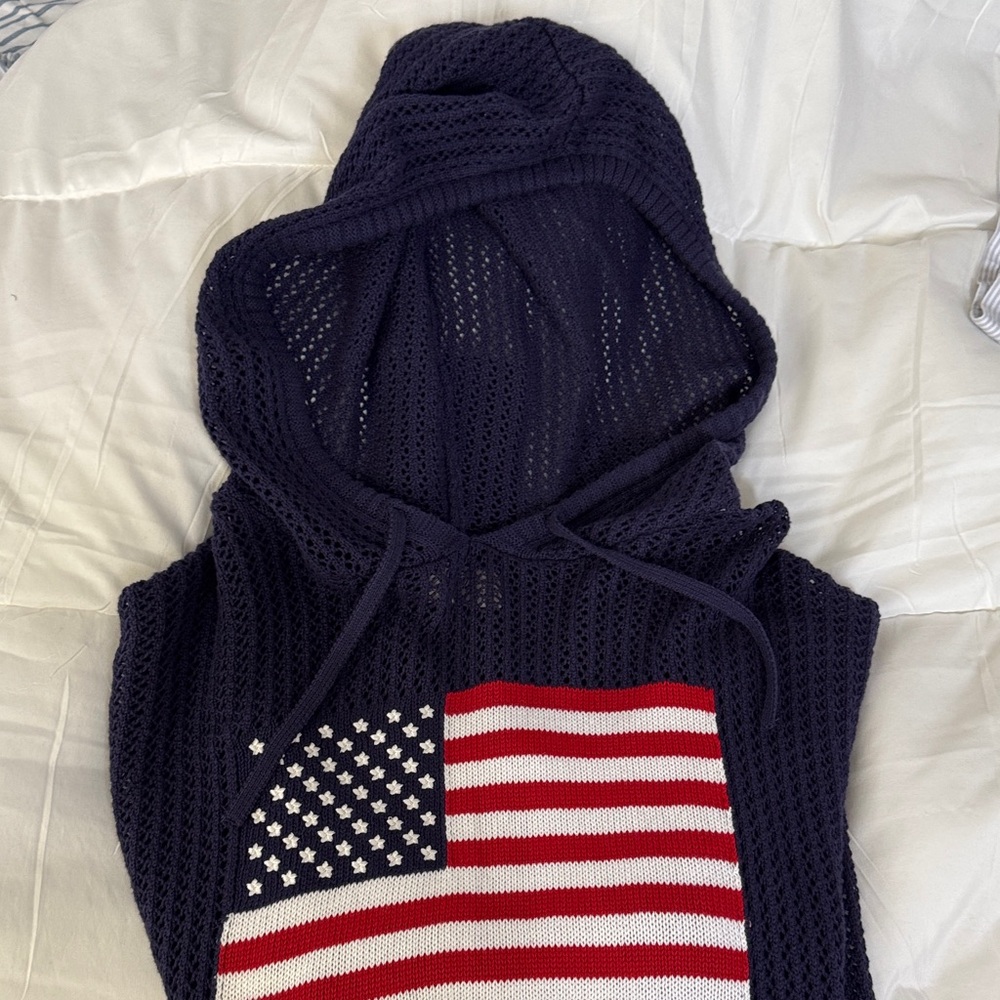 See through sweater with American flag.